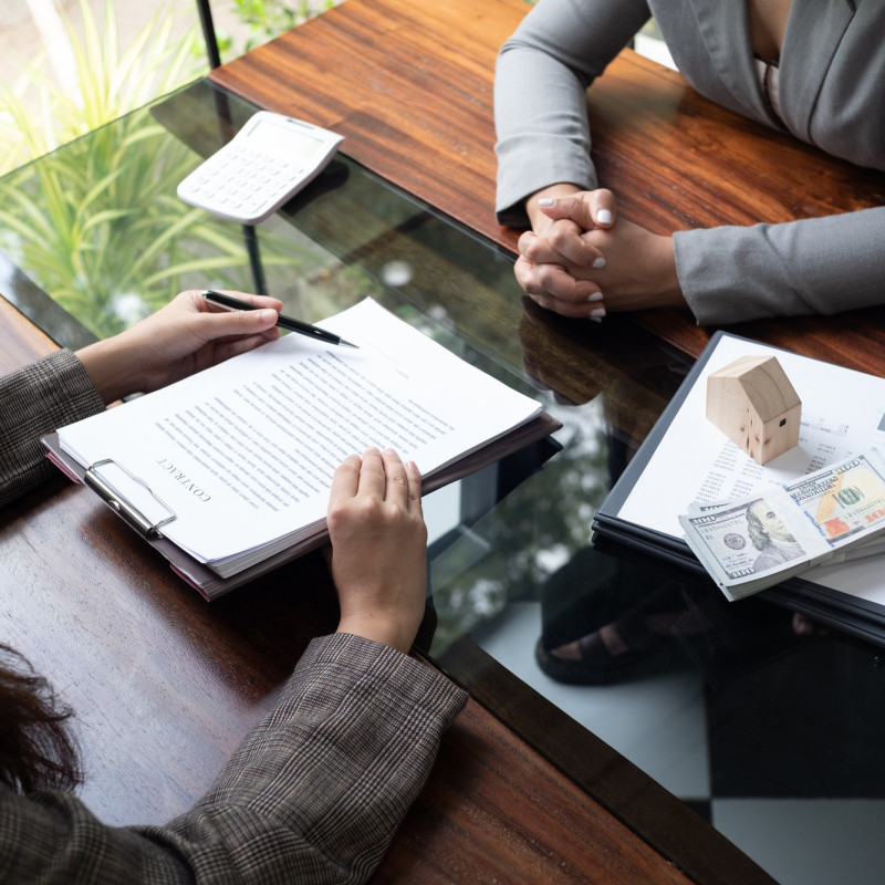 Real estate agent presenting and approved home loan contract. Real estate investment, Home mortgage